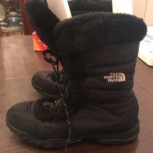 Black North Face down winter grip boots